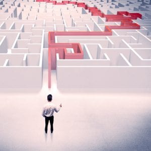 Man with Route to get Out of Maze